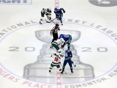 The  Minnesota Wild and the Vancouver Canucks face off in Game One of the Western Conference Qualification Round prior to the 2020 NHL Stanley Cup Playoffs at Rogers Place on August 02, 2020 in Edmonton, Alberta, Canada.
