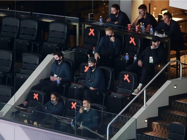 The Vancouver Canucks scratched teammates sit in the stands in Game One of the Western Conference Qualification Round prior to the 2020 NHL Stanley Cup Playoffs at Rogers Place on August 02, 2020 in Edmonton, Alberta, Canada.
