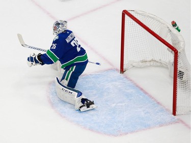 Jacob Markstrom #25 of the Vancouver Canucks reacts after giving up a first period shorthanded goal to Luke Kunin #19 of the Minnesota Wild in Game 2.