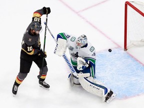 Nicolas Roy of the Vegas Golden Knights tries to screen netminder Jacob Markstrom of the Vancouver Canucks in Game 1 of their best-of-seven playoff series at Rogers Place in Edmonton. Game 4 in the series is Sunday night.