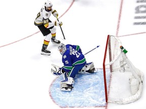 Alex Tuch of the Vegas Golden Knights fires the puck past Vancouver Canucks goalie Jacob Markstrom during the first period of Game 3 of the Canucks-Golden Knights second-round NHL Western Conference series at Rogers Place in Edmonton on Aug. 29, 2020.