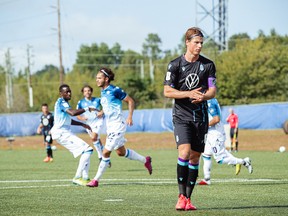 Belgian Pacific FC defender Lukas Macnaughton walks away after Halifax's João Morelli opened the scoring on a 10th minute penalty kick in Charlottetown, PEI, at the CPL's Island Games tournament.