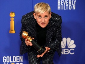 Ellen DeGeneres poses backstage with her Carol Burnett award at the Golden Gloves in Beverly Hills.