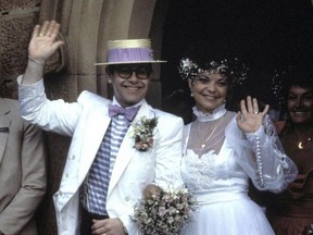 Singer Elton John and Renata Blauel on their wedding day in Sydney, Australia in 1984.