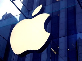 The Apple Inc. logo is seen hanging at the entrance to the Apple store on 5th Avenue in Manhattan, New York, U.S., October 16, 2019.