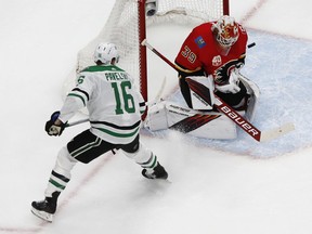 Calgary Flames goaltender Cam Talbot makes a save against Dallas Stars centre Joe Pavelski during the second period in game four of the first round of the 2020 Stanley Cup Playoffs at Rogers Place.