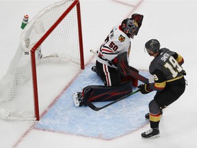 Vegas Golden Knights right wing Reilly Smith (19) scores a goal past Chicago Blackhawks goaltender Corey Crawford (50) during the third period in Game 1 of the first round of the 2020 Stanley Cup Playoffs at Rogers Place.