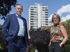 Vancouver, BC: AUGUST 12, 2020 -- Jill Atkey, CEO of the BC Non-Profit Housing Association, and Thom Armstrong, CEO Cooperative Housing Federation of BC, with 1501 Haro Street apartment in the background Wednesday, August 12, 2020.