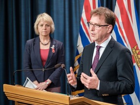 Provincial health officer Dr. Bonnie Henry and Health Minister Adrian Dix.