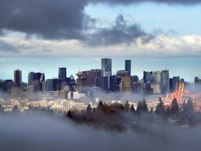 VANCOUVER, BC., December 3, 2017 -- Downtown Vancouver seen through the fog under heavy clouds from Capitol Hill, in Vancouver, BC., December 3, 2017. (NICK PROCAYLO/PostMedia) 00051583A ORG XMIT: 00051583A [PNG Merlin Archive]