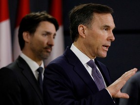 Finance Minister Bill Morneau attends a news conference with Prime Minister Justin Trudeau in Ottawa, Ontario, Canada March 11, 2020.