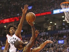 Cleveland's Kyrie Irving against Toronto Raptors Lucas Nogueira as the Raptos lost 116-112 to the Cleveland Cavaliers in Toronto, Ont. on Monday December 5, 2016.