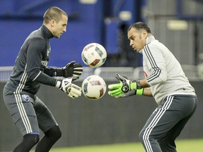 Evan Bush juggles soccer balls with goalkeeper coach Youssef Dahha during Montreal Impact training at Montreal's Olympic Stadium in 2016. Bush's relationship with Dahha has been one of the main reasons why he agreed to join Vancouver in 2020.