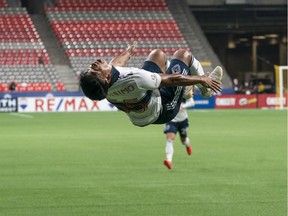 Michael Baldisimo #55 of the Vancouver Whitecaps performs a backflip while celebrating after scoring a goal against the Toronto FC during MLS soccer action at BC Place on September 5, 2020 in Vancouver, Canada.