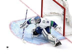 Thatcher Demko of the Vancouver Canucks makes one of his 43 saves on Tuesday against the Vegas Golden Knights at Rogers Place in Edmonton. The Canucks won Game 5 of the best-of-seven series 2-1, and now trail Vegas 3-2 in the series.