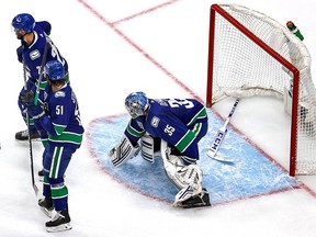 EDMONTON, ALBERTA - SEPTEMBER 03:  Thatcher Demko #35 of the Vancouver Canucks loses control of his stick against the Vegas Golden Knights during the third period in Game Six of the Western Conference Second Round during the 2020 NHL Stanley Cup Playoffs at Rogers Place on September 03, 2020 in Edmonton, Alberta, Canada. (Photo by Bruce Bennett/Getty Images) ORG XMIT: 775549426