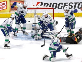 Thatcher Demko of the Vancouver Canucks stops a shot against the Vegas Golden Knights during the second period in Game Seven of the Western Conference second round during the 2020 NHL Stanley Cup Playoffs.