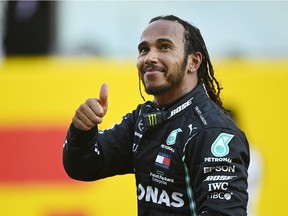 Race winner Lewis Hamilton of Great Britain and Mercedes GP celebrates in parc ferme during the F1 Grand Prix of Tuscany at Mugello Circuit on September 13, 2020 in Scarperia, Italy.