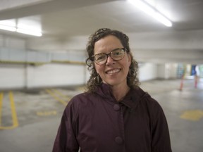 eghan Winters, associate professor in the faculty of health sciences at Simon Fraser University, stands in front of a row of empty parking spaces in a parkade in Vancouver's Chinatown.