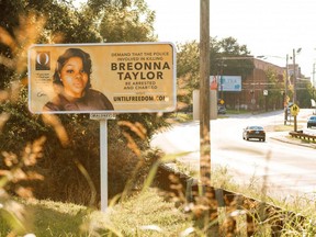 A billboard featuring a picture of Breonna Taylor and calling for the arrest of police officers involved in her death is seen on August 11, 2020 in Louisville, Kentucky.