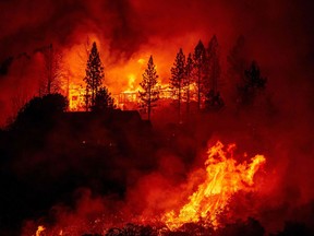 A home is engulfed in flames during the ‘Creek Fire’ in the Tollhouse area of unincorporated Fresno County in California on Sept. 8, 2020.