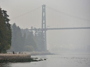 Stanley Park and the Lions Gate Bridge are covered in smog from clouds and smoke due to forest fires in Washington state, Oregon and California.