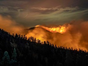 The Bobcat Fire continues to burn through the Angeles National Forest in Los Angeles County, north of Azusa, Calif., on Sept. 17, 2020.