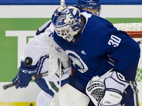 Goalie Jake Kielly blocks a shot during Canucks training camp in Victoria in September 2019.