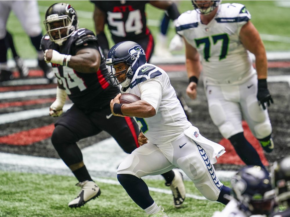 Russell Wilson throws 4 TD passes, Seahawks beat Falcons 38-25