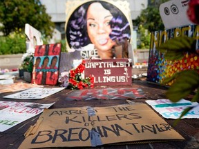 Signs used during protests and rallies are gathered around a memorial for Breonna Taylor in Louisville, Kentucky, U.S., September 10, 2020.