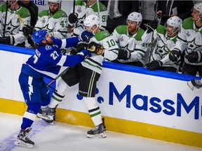 Tampa Bay Lightning defenceman Ryan McDonagh (27) checks Dallas Stars right wing Corey Perry (10) during the second period in game two of the 2020 Stanley Cup Final at Rogers Place.