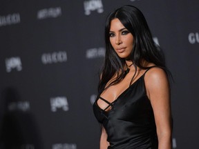 In this file photo taken on Nov. 3, 2018, Kim Kardashian-West arrives for the 2018 LACMA Art+Film Gala at the Los Angeles County Museum of Art in Los Angeles.