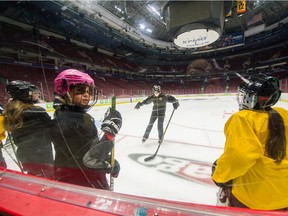 The Vancouver Angels girls' hockey team practises inside Rogers Arena in Vancouver on Sept. 16 following an ice rental partnership with the Vancouver Canucks.