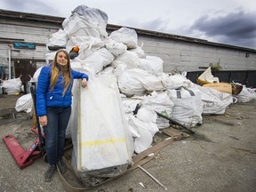 Chloé Dubois, president of the Ocean Legacy Foundation, pictured in 2017 with a fraction of the debris brought in for recycling from B.C. beaches.