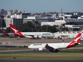 Qantas planes are seen at Kingsford Smith International Airport in Sydney, Australia, March 18, 2020.
