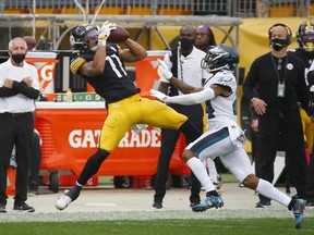 Chase Claypool of the Steelers makes a catch that is later overturned in the second half against Darius Slay of the Philadelphia Eagles on Oct. 11 at Heinz Field in Pittsburgh.