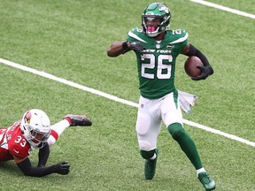 Le'Veon Bell of the New York Jets runs with the ball against the Arizona Cardinals at MetLife Stadium on Oct. 11, 2020 in East Rutherford, N.J.