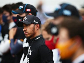PORTIMAO, PORTUGAL - OCTOBER 25: Lewis Hamilton of Great Britain and Mercedes GP is pictured as the drivers stand for the national anthem before the F1 Grand Prix of Portugal at Autodromo Internacional do Algarve on October 25, 2020 in Portimao, Portugal.