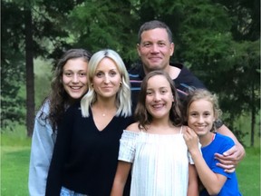 Jaclyn Robinson, second from left, with (left to right) daughters Ellie, Charlotte and Mia and husband Kirk Robinson. Jaclyn is a public health nurse who contracted COVID and was hospitalized and on a ventilator for a week in April. Months later, she is still experiencing symptoms and medical research is showing that is common for the majority of those who recover.