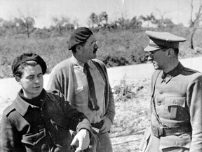 Ernest Hemingway, centre, in Spain during Spanish Civil War, 1937.