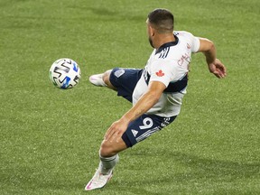 Vancouver Whitecaps forward Lucas Cavallini scores his second goal during the second half against Los Angeles FC at Providence Park.