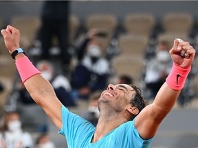 Spain's Rafael Nadal celebrates after winning against Serbia's Novak Djokovic at the end of their men's final tennis match at the Philippe Chatrier court on Day 15 of The Roland Garros 2020 French Open tennis tournament in Paris on October 11, 2020.