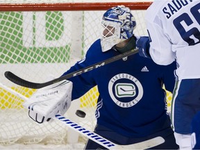 Dylan Sadowy takes a shot on goalie Jake Kielly during the second day of Canucks Training Camp at the Save-On-Foods Arena, Victoria, September 14 2019.