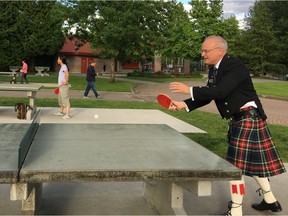The mayors of Vancouver, Surrey, Richmond and Coquitlam all have deep Scottish roots. Photo: Coquitlam Mayor Richard Stewart plays ping pong in the park while wearing his family's tartan kilt.