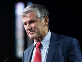 B.C. Liberal Leader Andrew Wilkinson leaves the stage after announcing he is stepping down as party leader, during a news conference in Burnaby, B.C., on Monday, October 26, 2020.