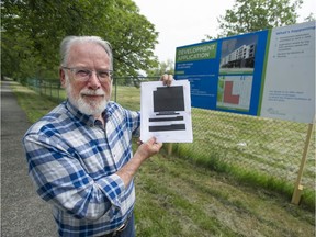 Former NDP MLA David Chudnovsky with a copy of a heavily redacted contract between B.C. Housing and Holborn Properties, that he received via an FOI request. The contract covers the sale of the Little Mountain property.