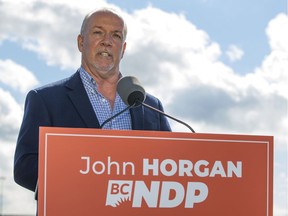With just a day left in the election campaign, the B.C. NDP retain a commanding lead over the B.C. Liberals, a poll released Friday morning suggests.