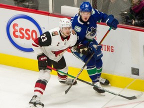 The Vancouver Canucks said they tried to make a deal to obtain star defenceman Oliver Ekman-Larsson, left, but Canucks' GM Jim Benning said the Arizona Coyotes asking price wasn't acceptable.