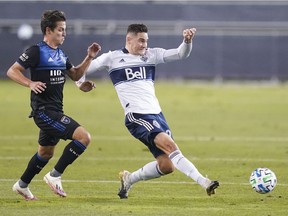 Vancouver Whitecaps defender Jake Nerwinski, right, kicks the ball against San Jose Earthquakes Carlos Fierro during MLS action at Earthquakes Stadium on Oct. 7. He will play his 100th game as a member of the Caps organization on Saturday when they face RSL.