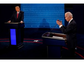 Democratic presidential candidate Joe Biden, right, answers a question as President Donald Trump listens during the second and final presidential debate in Nashville, Tennessee, Thursday night.